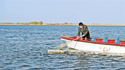 环保人：打好蓝绿交织生态底色
