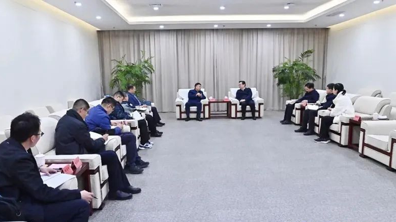 张国华与中储粮集团公司副总经理周维现一行举行工作座谈